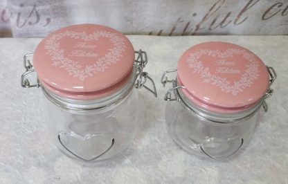 Barattoli in vetro con tappo rosa set da due pezzi - immagine 2