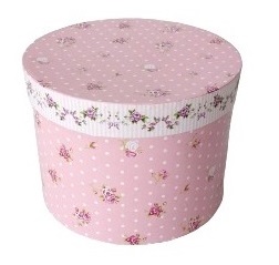 Scatola rotonda rosa a pois