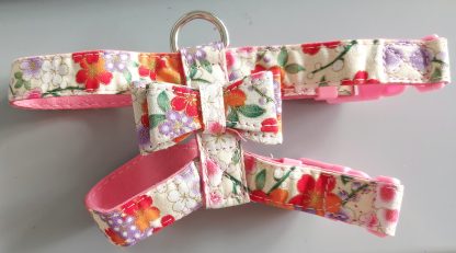 Pettorina a fiori con fiocco - immagine 2
